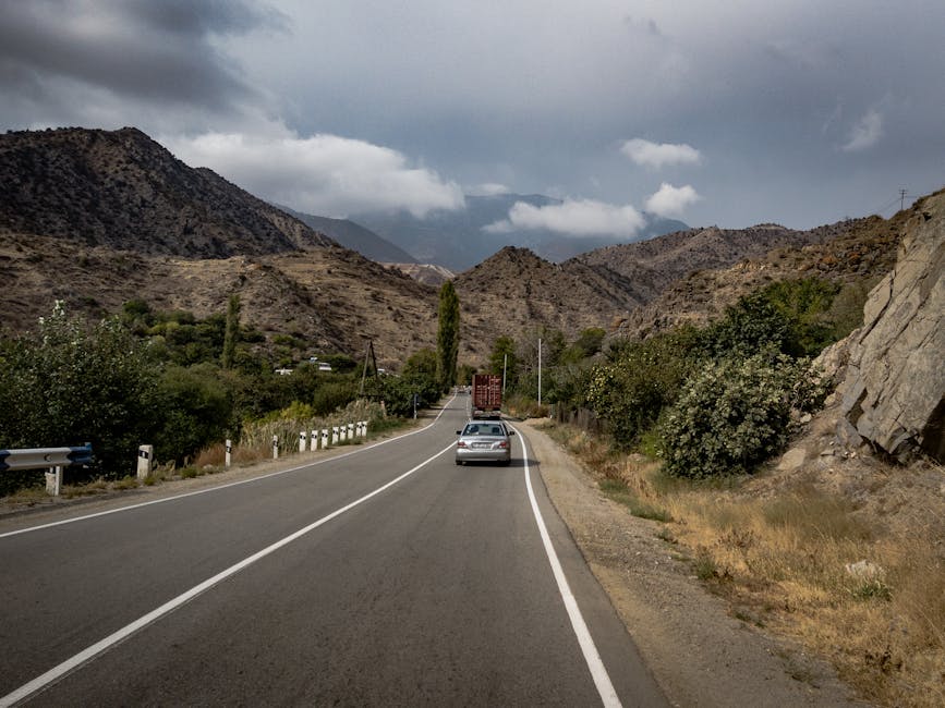 A mountain road winding through Armenian highlands in autumn