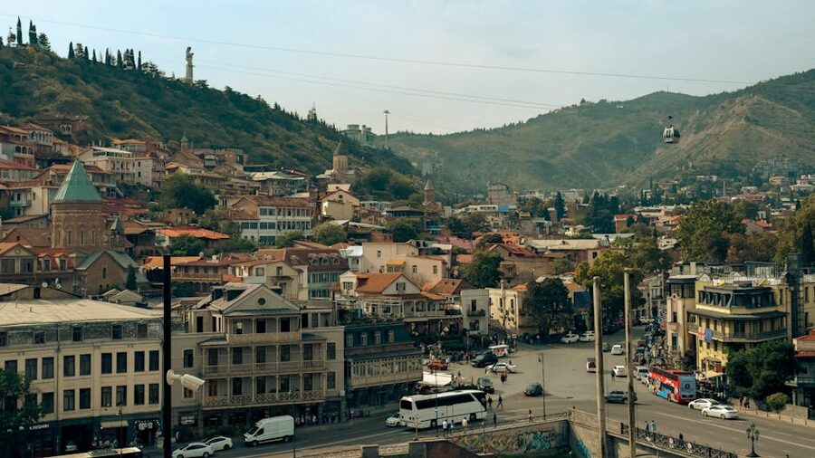 Tbilisi old town and cable car over the Mtkvari river, Georgia