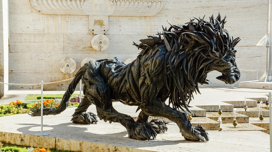 Detail view of Lion 2 by Ji Yong-Ho showing rubber tire scales