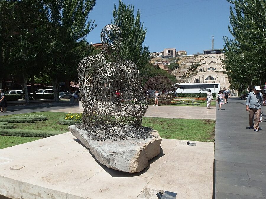 Shadows I sculpture by Jaume Plensa on a Cascade terrace