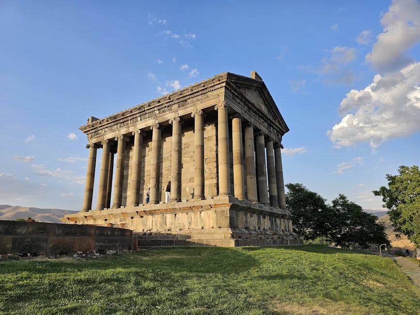 Garni Temple under bright clear blue sky on a summer afternoon