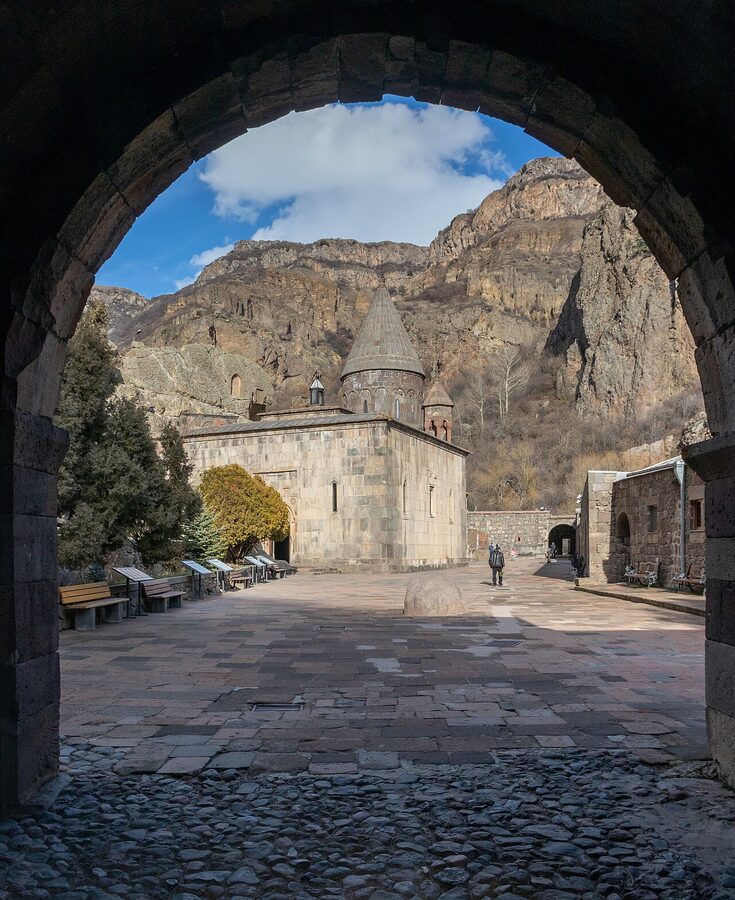 Katoghike church portal at Geghard with carved stone tympanum