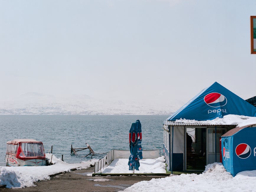 Lakeside bungalow with snow at Lake Sevan