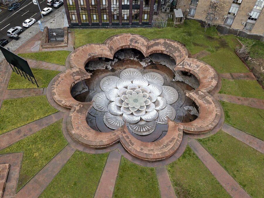 Aerial view of Republic Square showing the oval roundabout and trapezoid pool