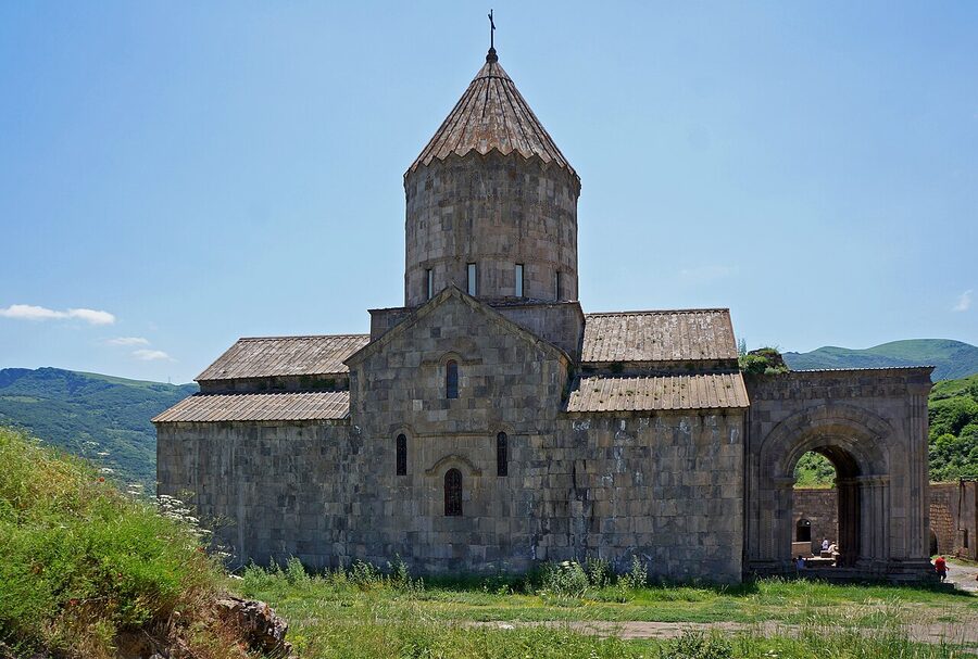 Aerial view of Tatev Monastery in summer with surrounding green hills