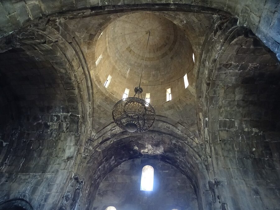 Interior of Surp Poghos-Petros church at Tatev Monastery showing the dome and altar
