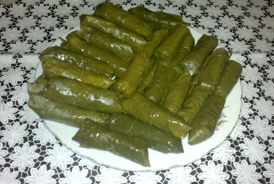 Armenian dolma stuffed grape leaves before cooking