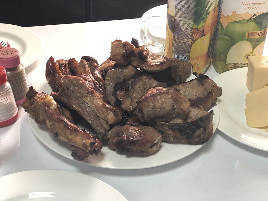 Armenian khorovats served on a platter at a table