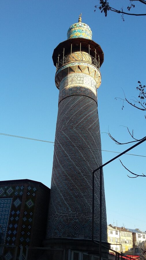 Courtyard of the Blue Mosque in Yerevan with blue tilework and trees